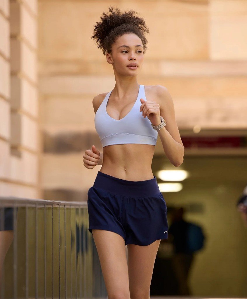 Runner in sports bra and shorts — Activewear by Zypora Activewear